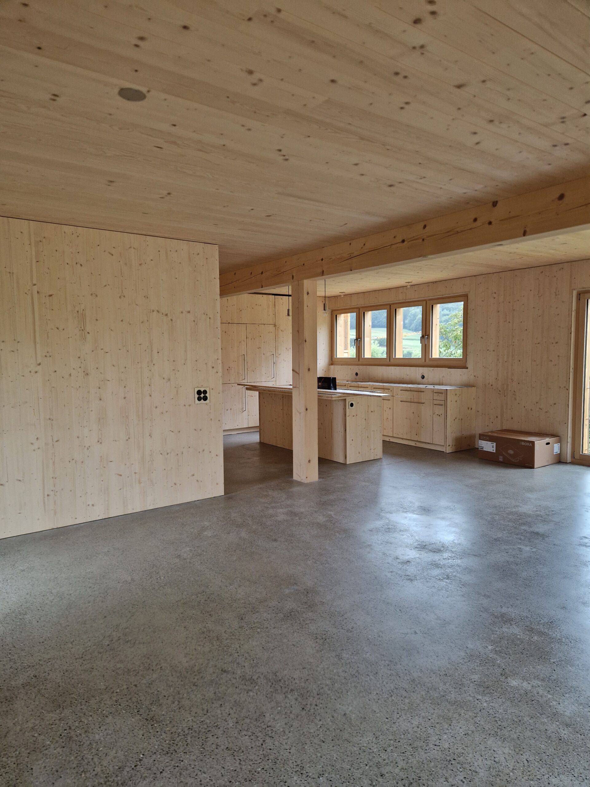 Construction d_une villa individuelle Courtepin - Séjour Cuisine